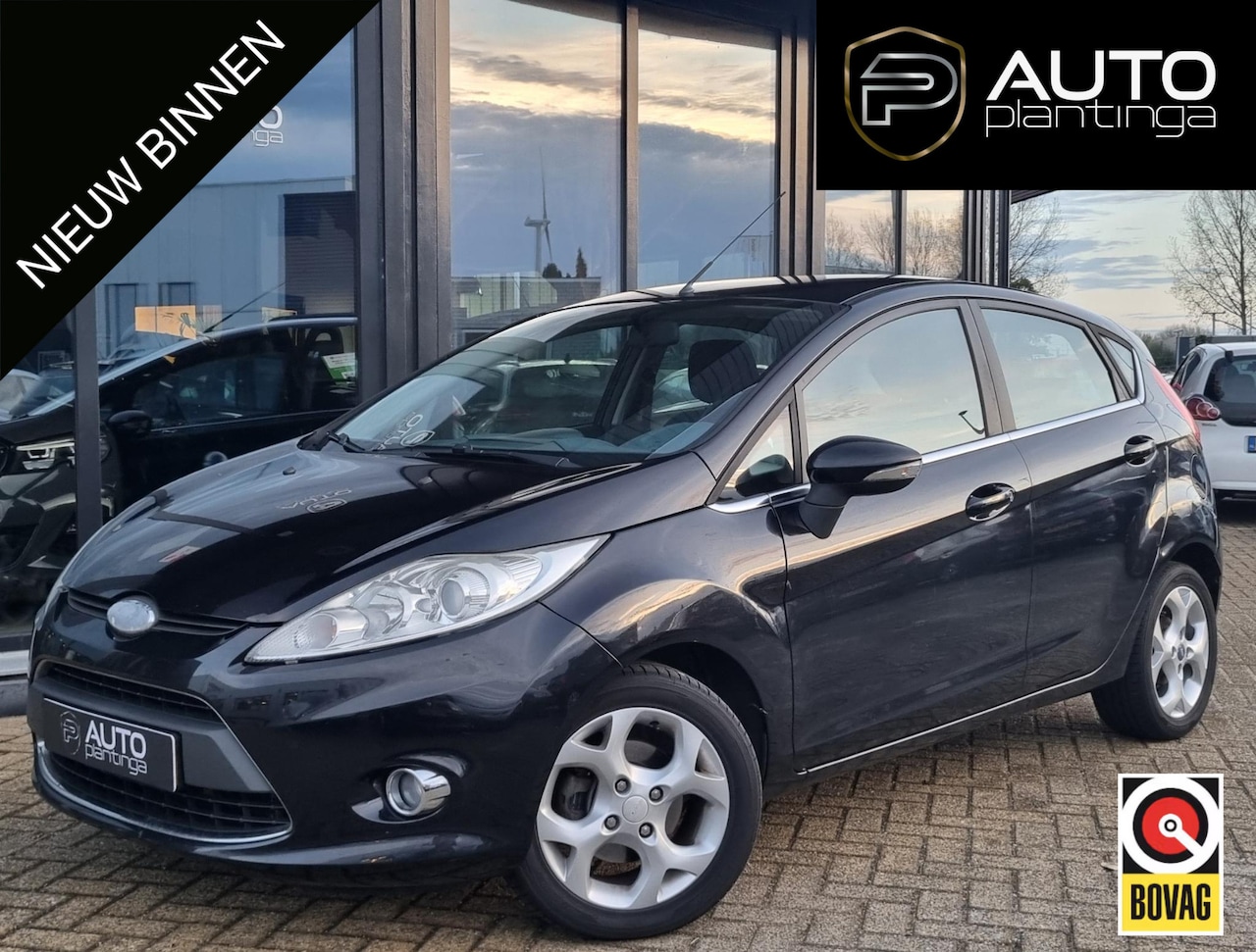 Ford Fiesta - 1.25 Titanium 82PK | Dealeronderhouden! | Trekhaak | Airco | Lichtmetalen Velgen | 5 Deurs - AutoWereld.nl