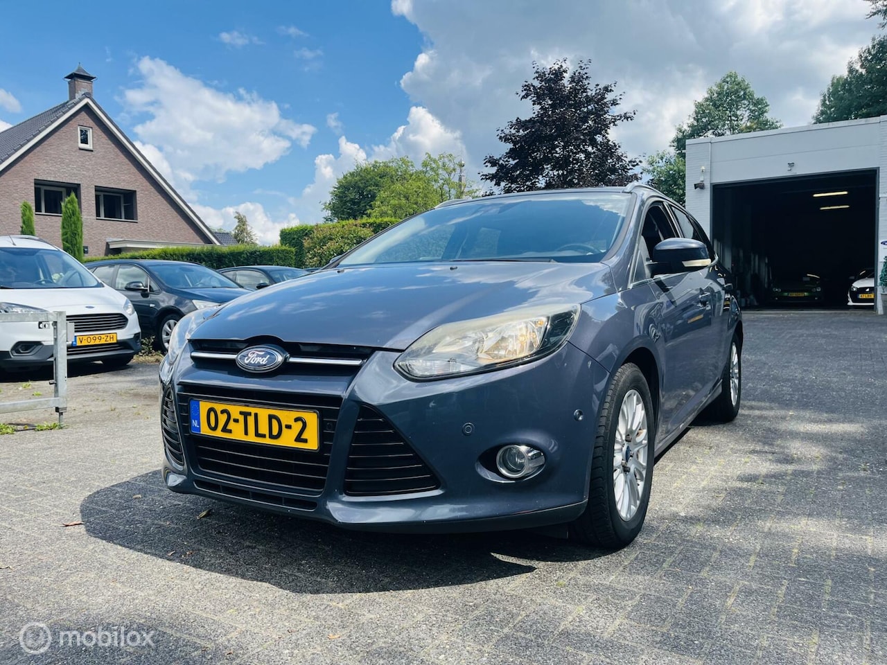 Ford Focus Wagon - 1.6 150PK EcoBoost Titanium Clima / LM / Audio / PDC - AutoWereld.nl