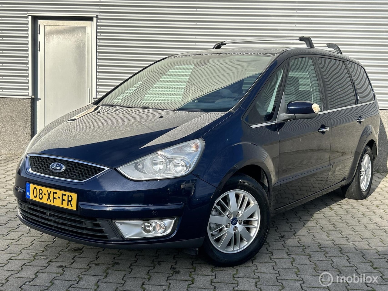 Ford Galaxy - 2.0-16V Ghia 2.0-16V Ghia,7-persoons,Panoramadak,PDC,trekhaak - AutoWereld.nl