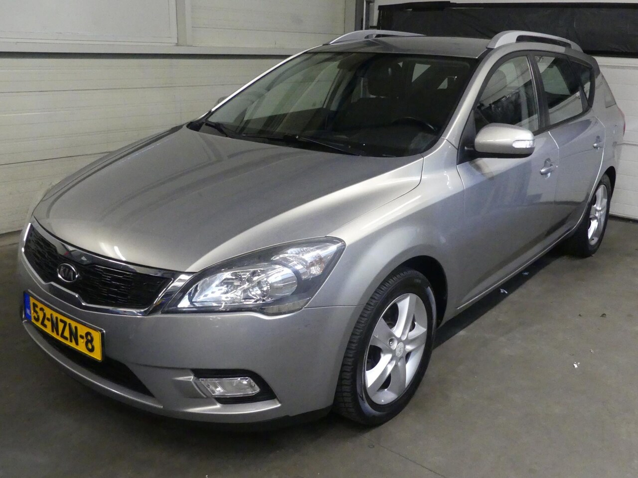 Kia Cee'd Sporty Wagon - 1.4 CVVT X-ecutive - Airco - Cruise Control - AutoWereld.nl