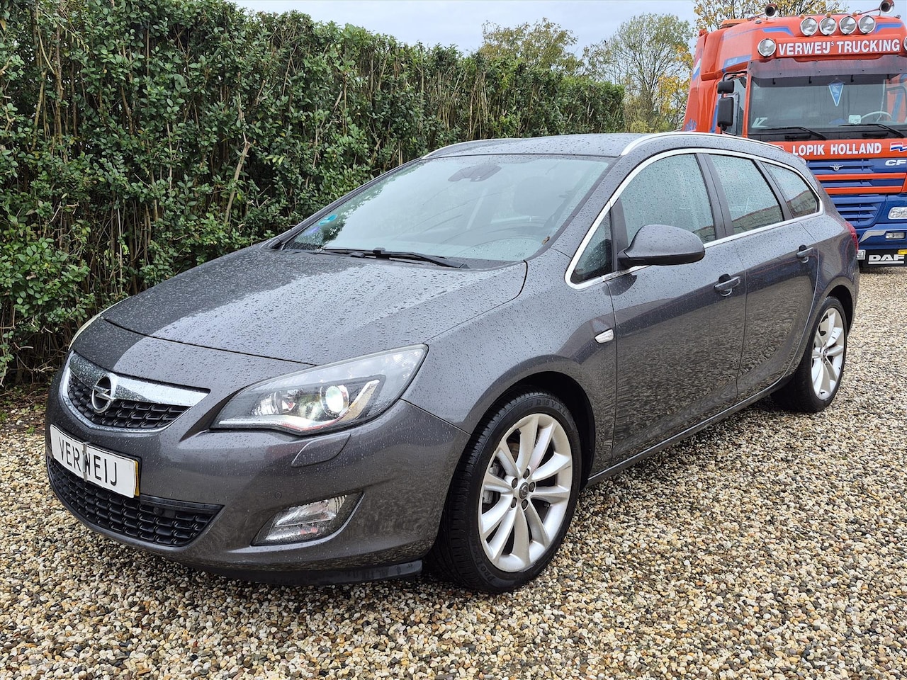 Opel Astra - 1.4 Turbo 140pk Sport | Clima | Cruise | Navi | LM Velgen - AutoWereld.nl