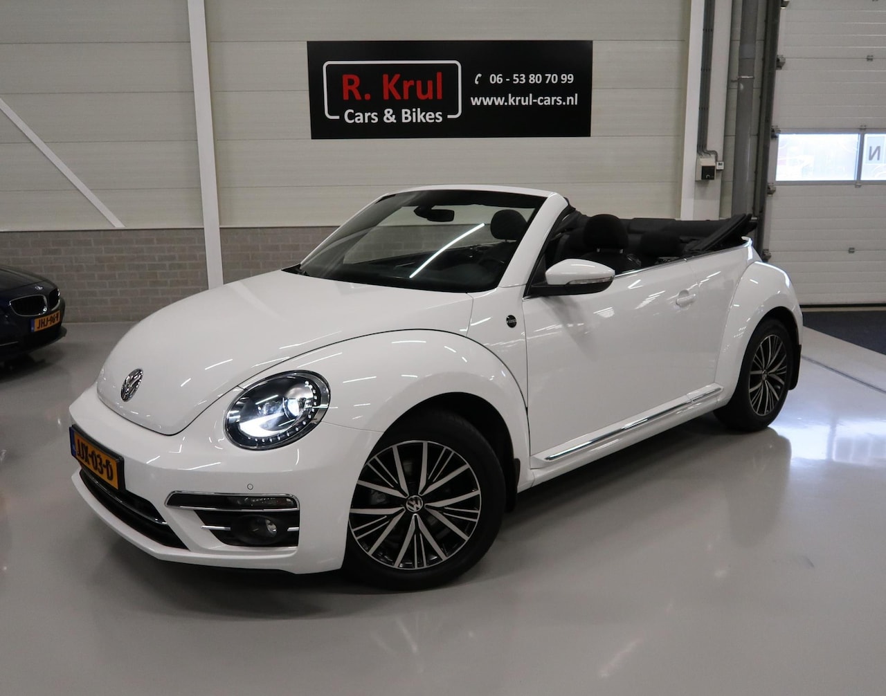 Volkswagen Beetle Cabriolet - 1.4 TSI Sound 150pk Automaat Navigatie 1e Eigenares App connect Stoelverwarming Xenon Wind - AutoWereld.nl