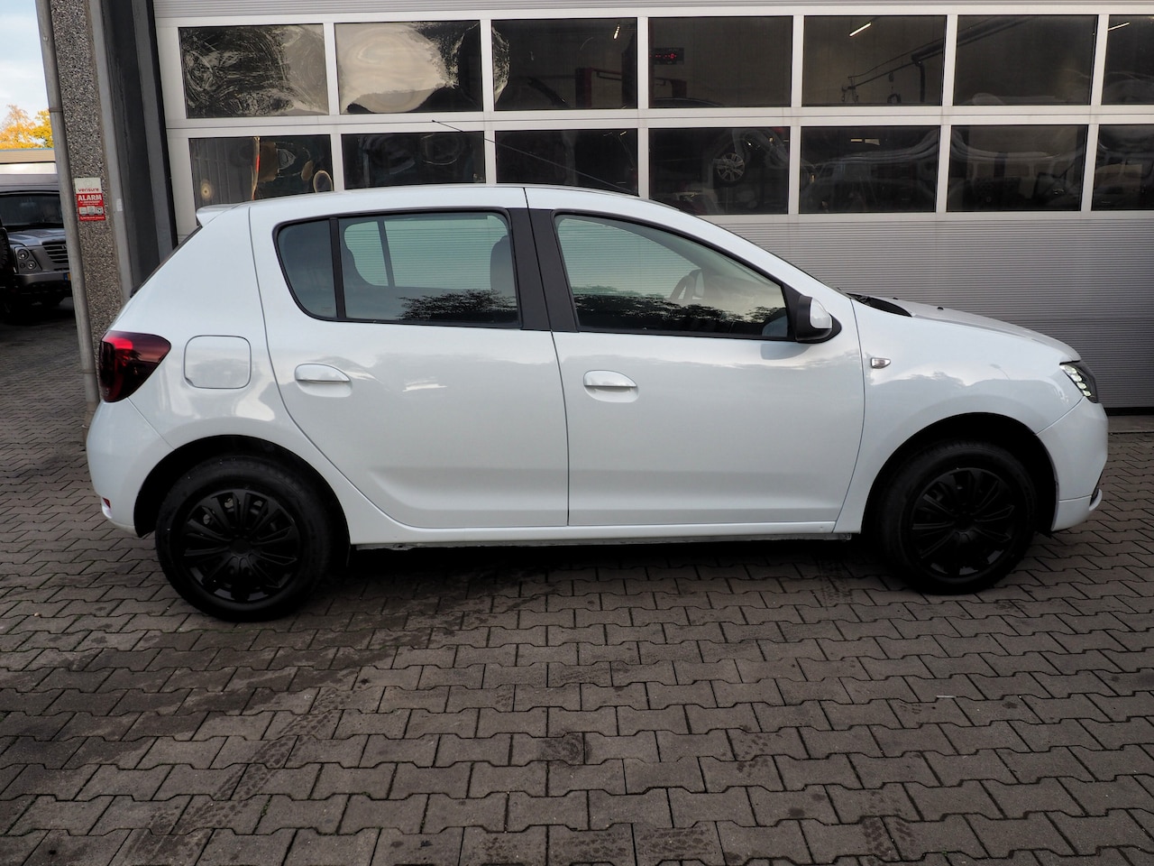 Dacia Sandero - 1.0 Sce Laureate NW MOTOR! AIRCO TREKH.