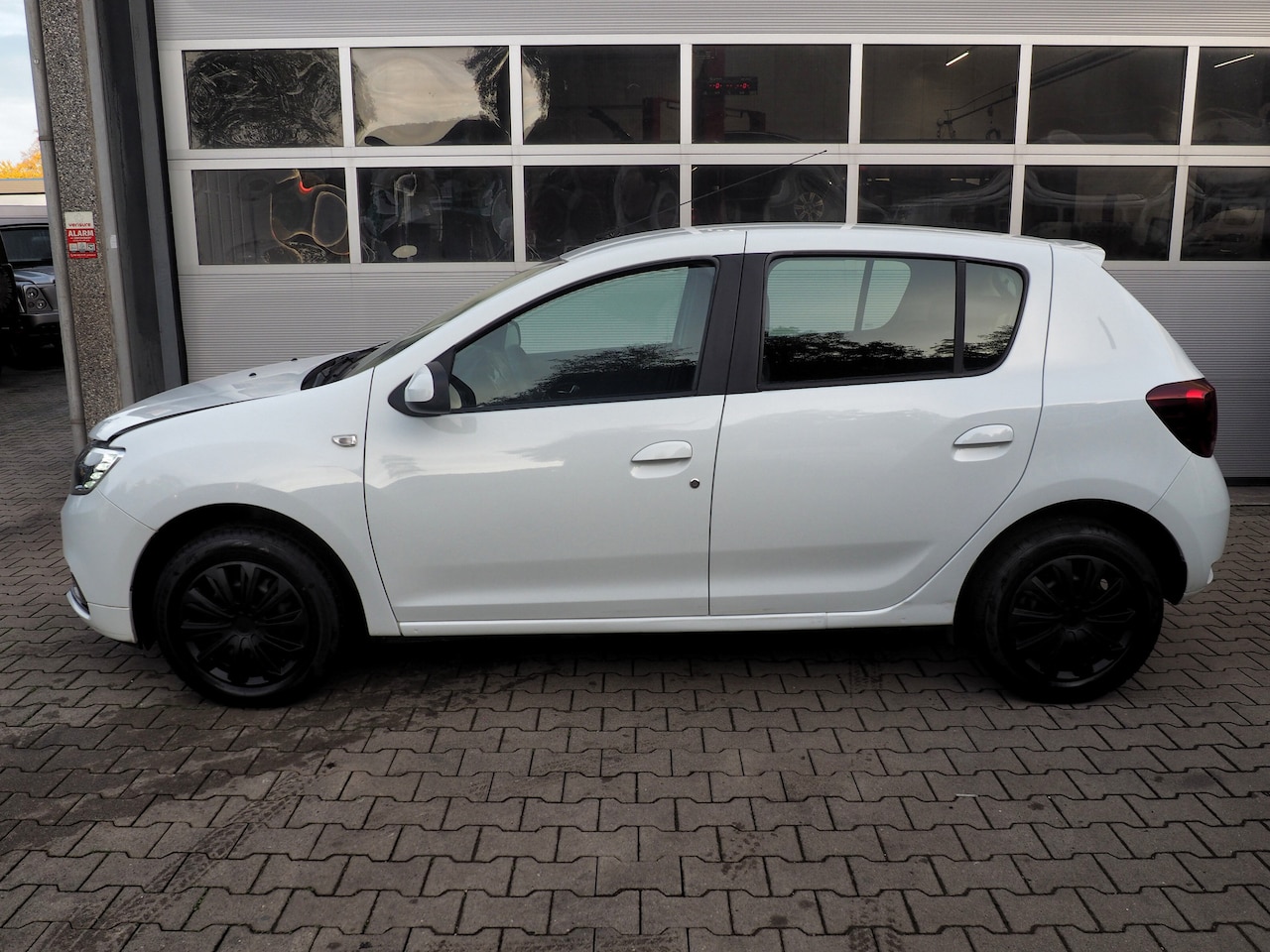 Dacia Sandero - 1.0 Sce Laureate NW MOTOR! AIRCO TREKH.