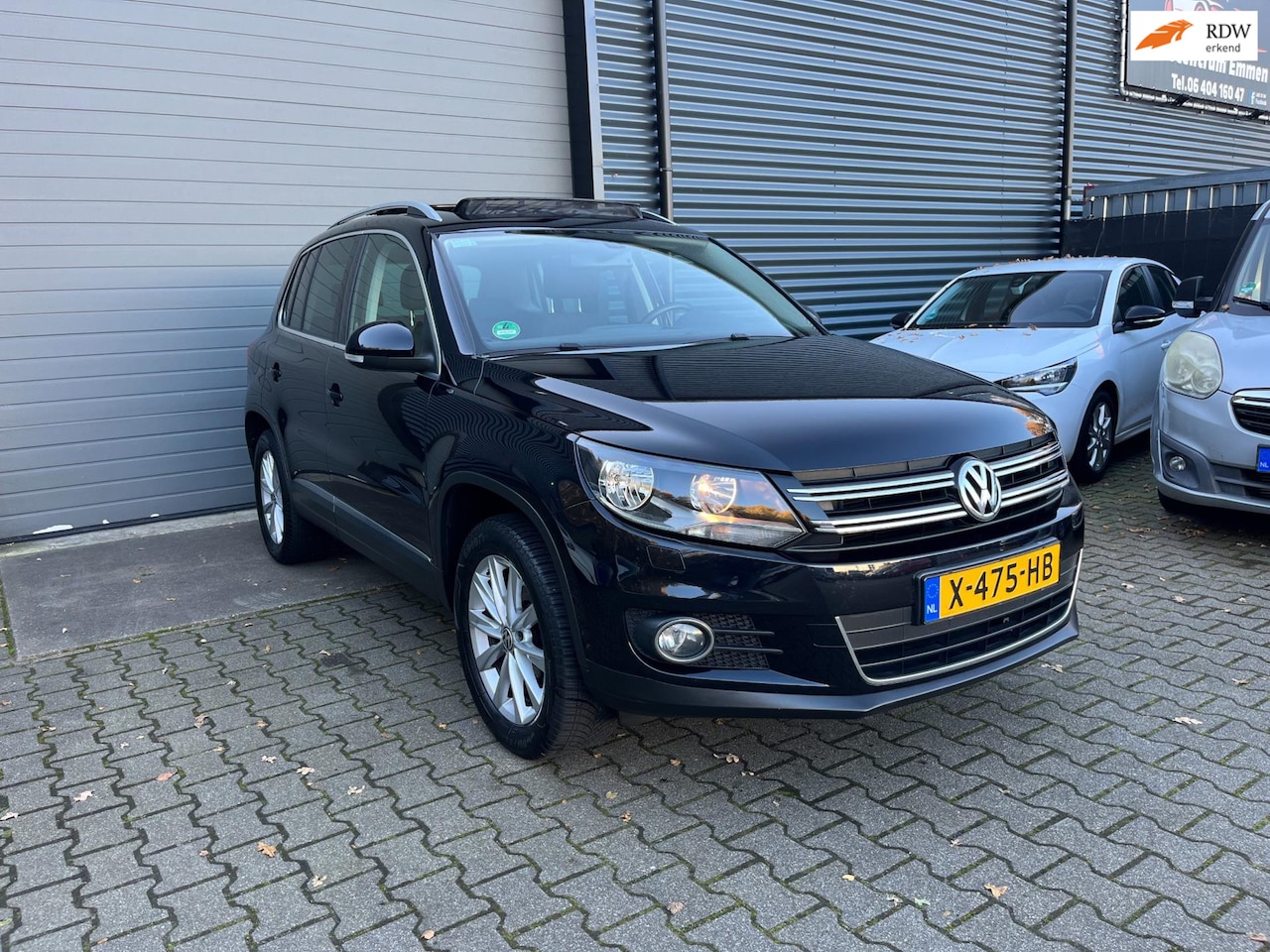 Volkswagen Tiguan - 1.4 TSI Sport&Style TREKHAAK/STOELVERWARMING/PANO - AutoWereld.nl