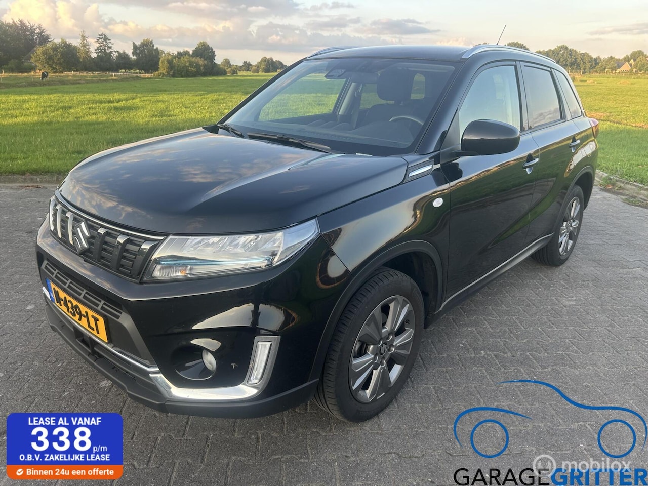 Suzuki Vitara - 1.4 Boosterjet Style Smart Hybrid 1.4 Boosterjet Style Smart Hybrid - AutoWereld.nl