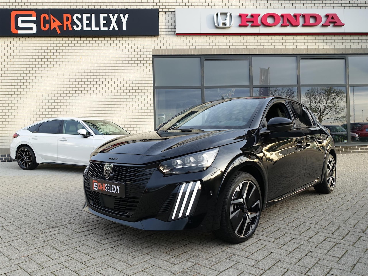 Peugeot 208 - 1.2 Hybrid 136 e-DCS6 GT - AutoWereld.nl