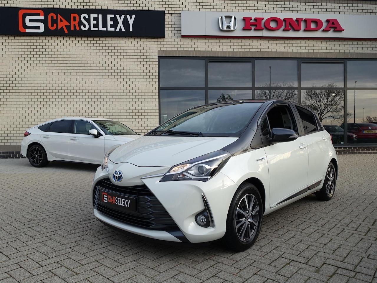 Toyota Yaris - 1.5 Hybrid 100pk CVT - AutoWereld.nl