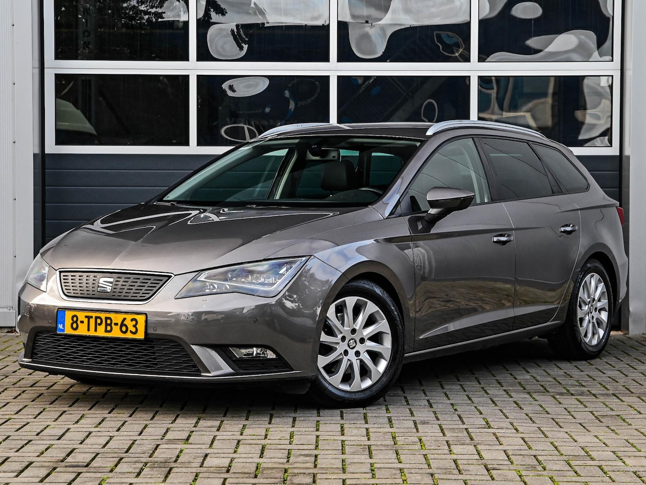 SEAT Leon ST - 1.6 TDI Style Business | Navi | Leder/alcantara | PDC v+a | Climate control | Cruise contr - AutoWereld.nl