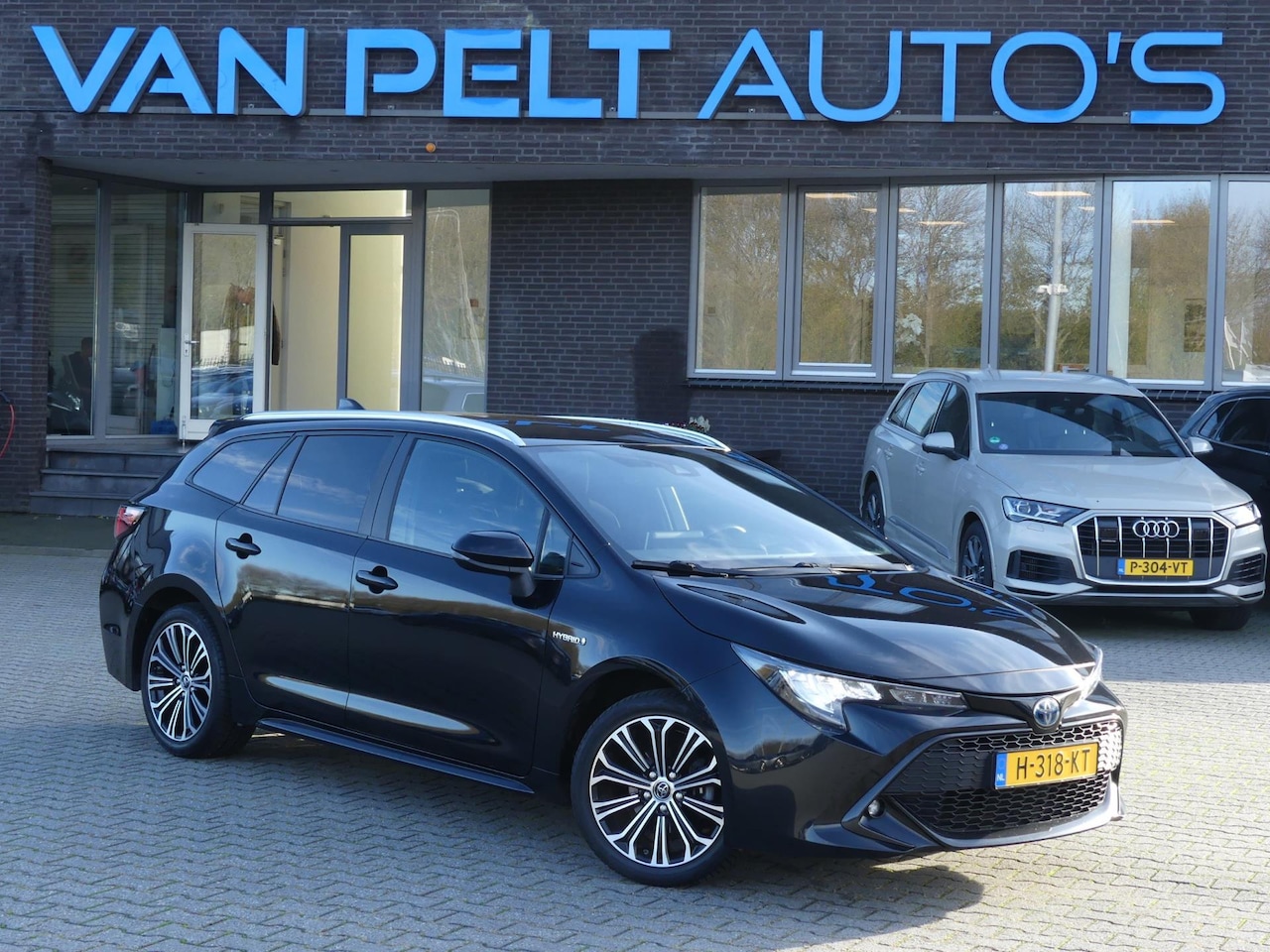 Toyota Corolla Touring Sports - 1.8 Hybrid Business Plus / Carplay / Stoelverwarming - AutoWereld.nl