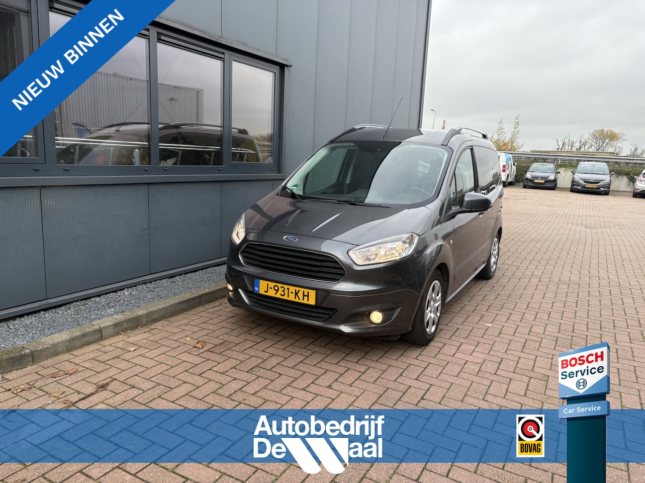 Ford Tourneo Courier - 1.0 Ecoboost 100pk Titanium AIRCO/CRUISE/PDC/TREKHAAK - AutoWereld.nl