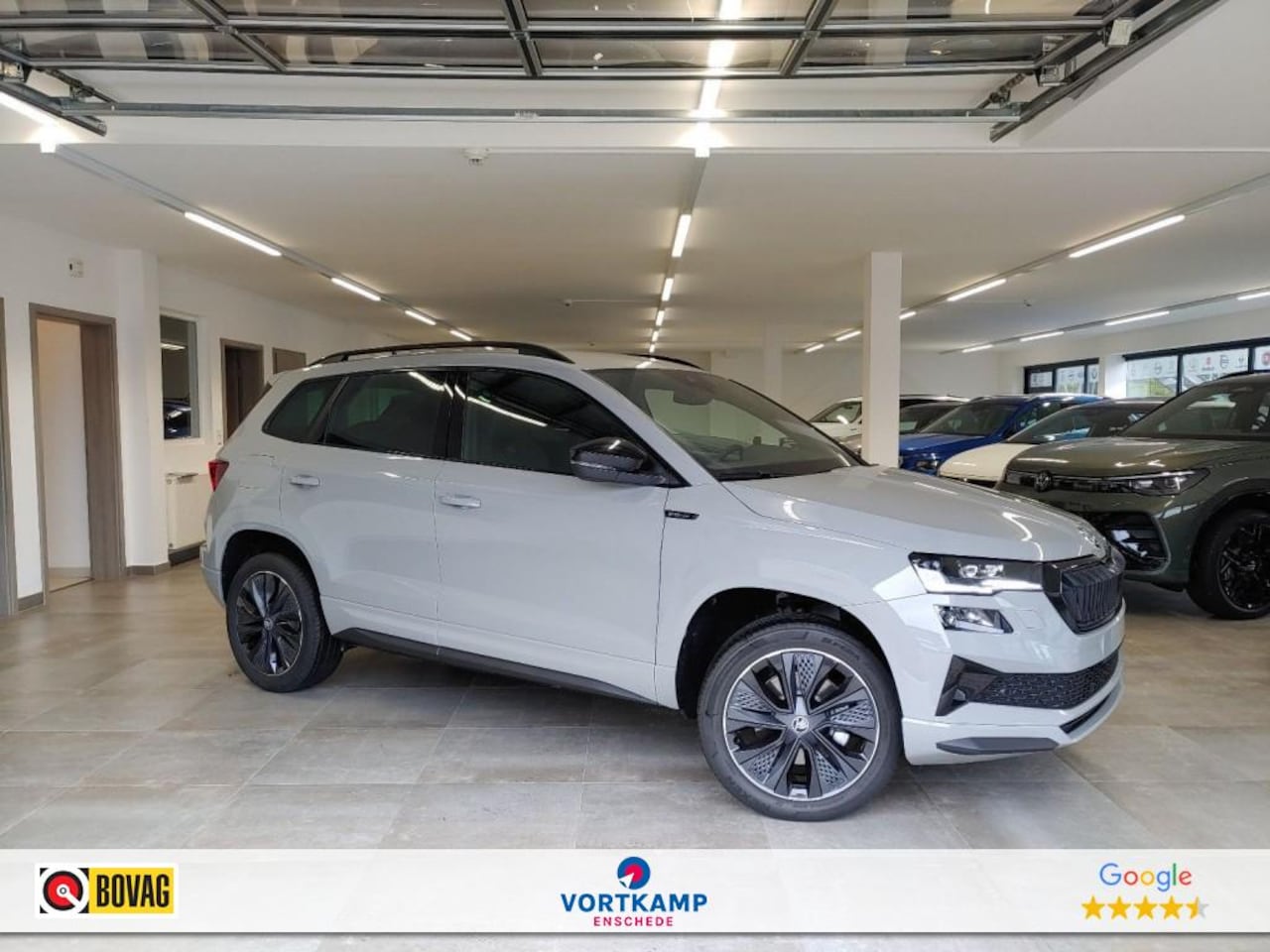 Skoda Karoq - 1.5 TSI DSG SPORTLINE TREKHAAK/CAMERA/CARPLAY/ACC/STOELVERW/E-KLEP - AutoWereld.nl