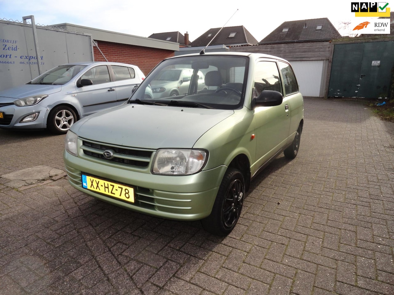 Daihatsu Cuore - 1.0 AUT-12V XTi (132776 NAP) NIEUW APK - AutoWereld.nl