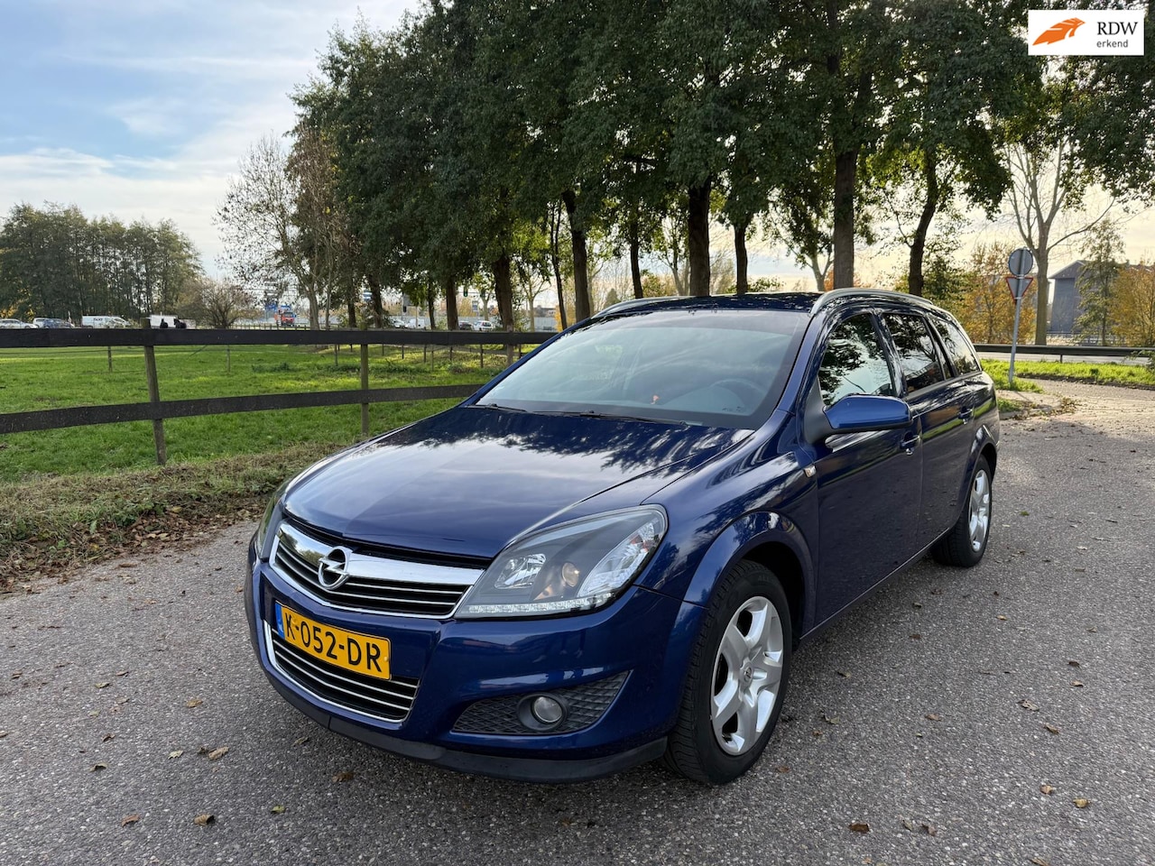 Opel Astra Wagon - 1.6 Cosmo Airco Navi Benzine Station - AutoWereld.nl