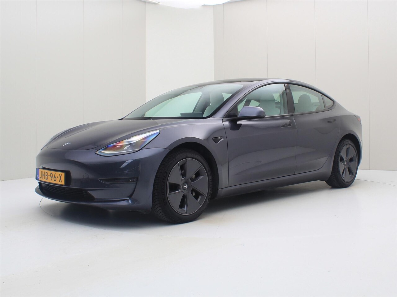 Tesla Model 3 - Long-Range AWD 351pk 75 kWh FACELIFT [ WIT LEDER+FSD+WARMTEPOMP+620KM WLTP+PREMIUM AUDIO ] - AutoWereld.nl