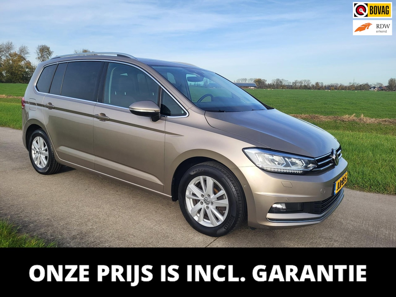 Volkswagen Touran - 1.5 TSI Highline 7pers. navi camera trekhaak electr achterklep - AutoWereld.nl