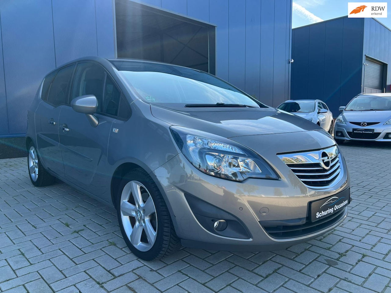 Opel Meriva - 1.4 Cosmo / NAVIGATIE / CLIMATE / CRUISE / PDC / TREKHAAK / STOELVERWARMING / LEDER - AutoWereld.nl