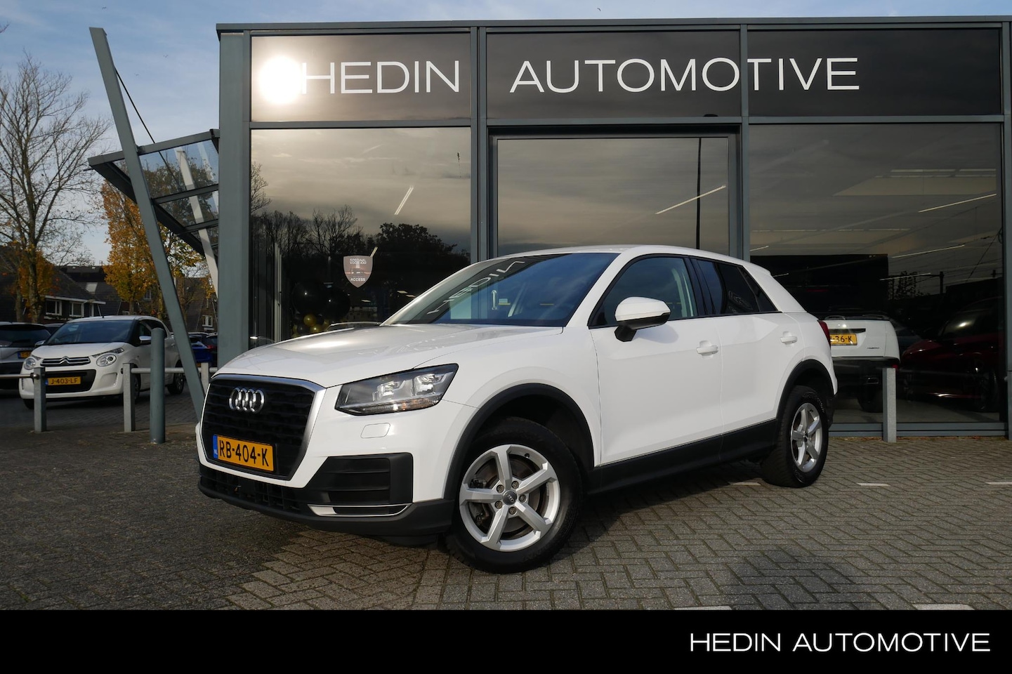 Audi Q2 - 1.0 TFSI Sport | Incl. zomer en winter band | Automaat | Navigatie | Climate control | - AutoWereld.nl