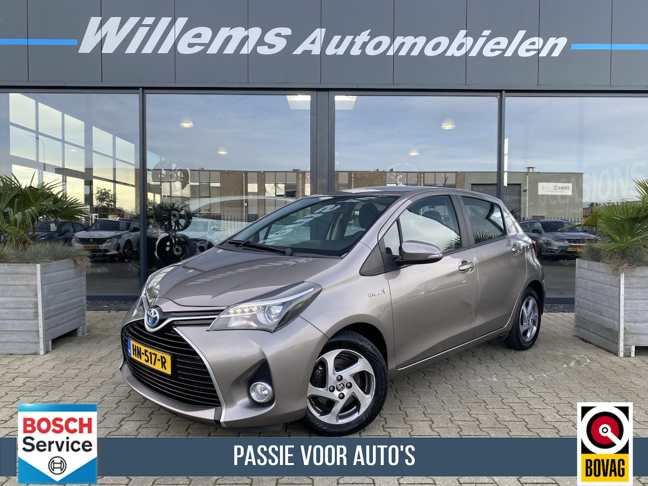 Toyota Yaris - 1.5 Hybrid Lease Limited Navigatie & Clima & Camera - AutoWereld.nl