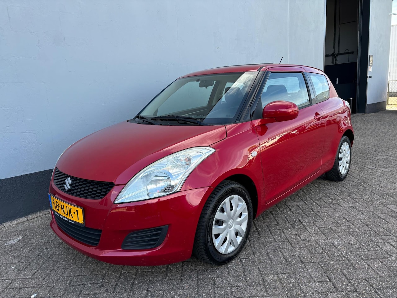 Suzuki Swift - 1.2 Comfort - Airco - Elek. Kantel/Schuif Dak - AutoWereld.nl
