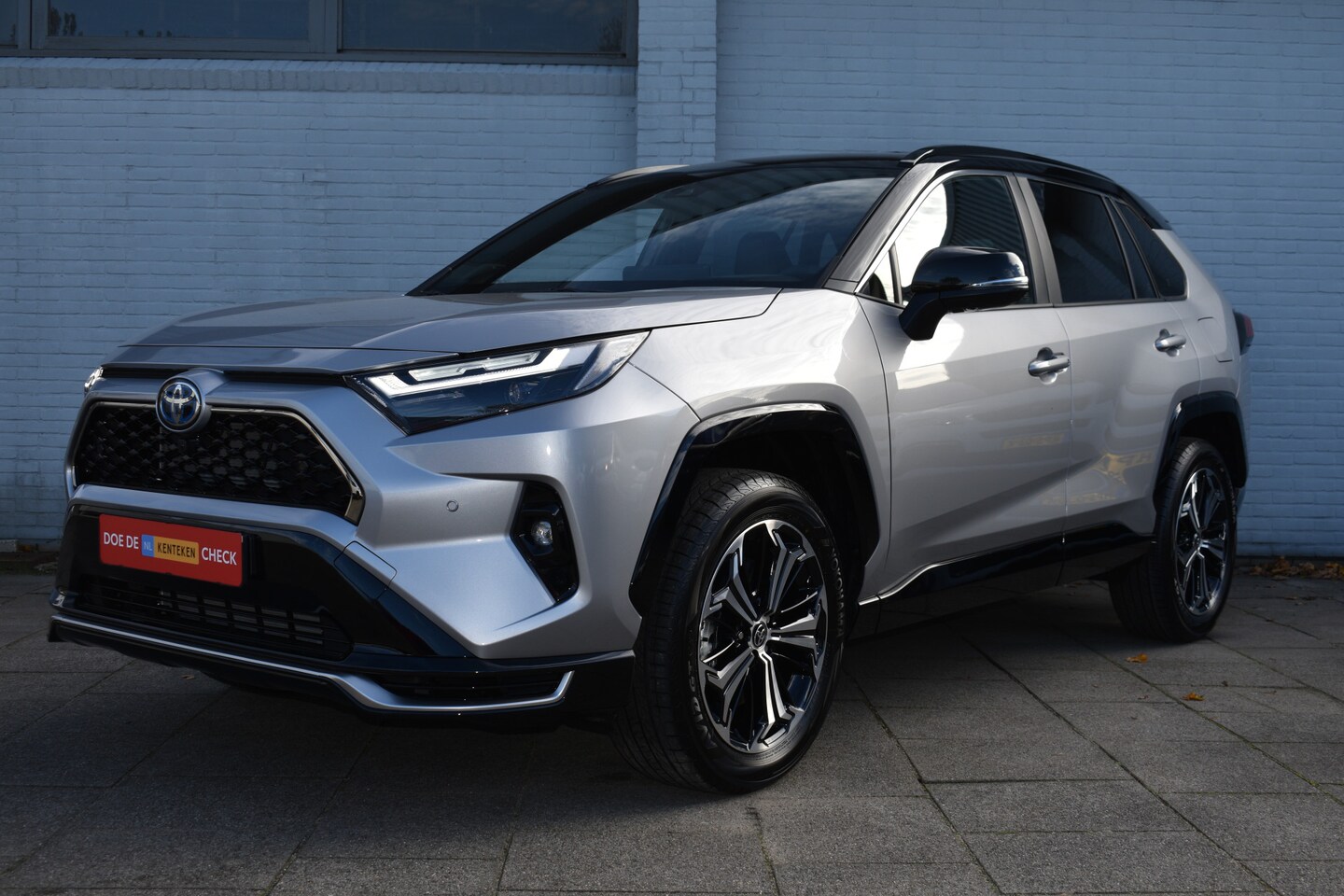 Toyota RAV4 - 2.5 Plug-in Hybrid AWD Bi-Tone Plus Automaat 306pk | PDC | BSM | JBL | Geheugenfunctie op - AutoWereld.nl