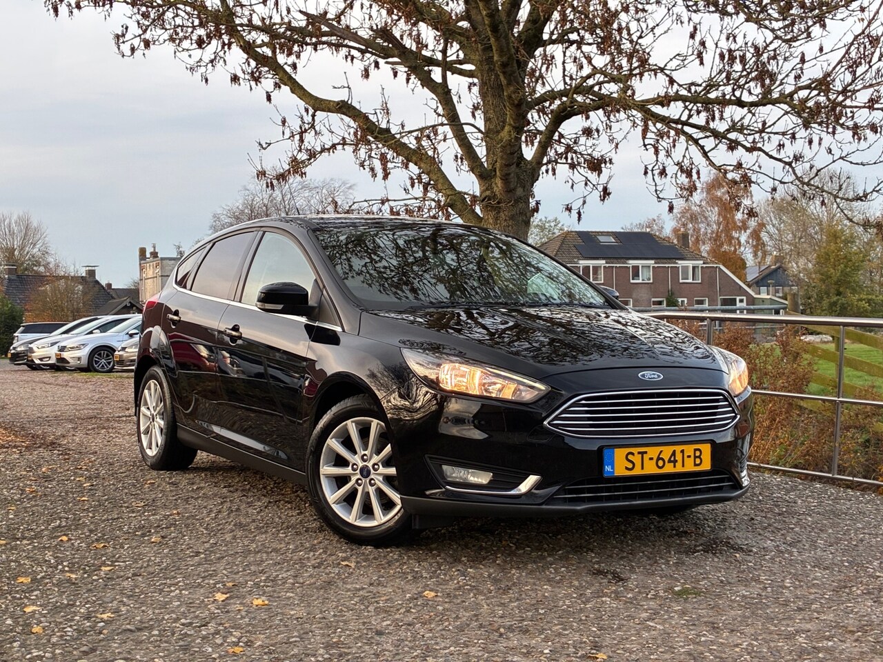Ford Focus - 1.0 Titanium | Cruise + Clima + Navi Nu € 7.975,-!!! - AutoWereld.nl