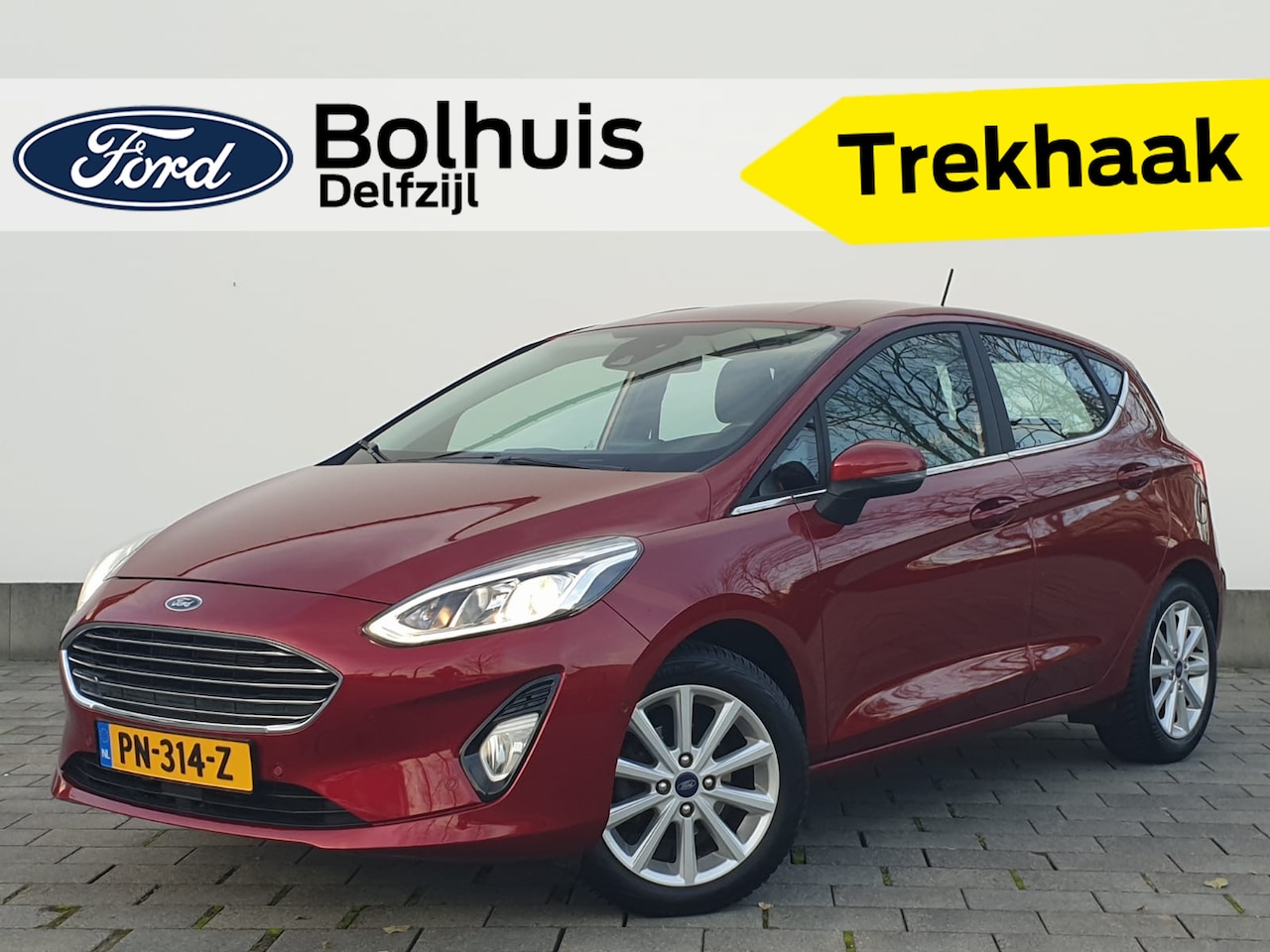 Ford Fiesta - EcoBoost Titanium | Adapt. Cruise | Trekhaak | B&O | Climate control | Camera | Verwarmde - AutoWereld.nl