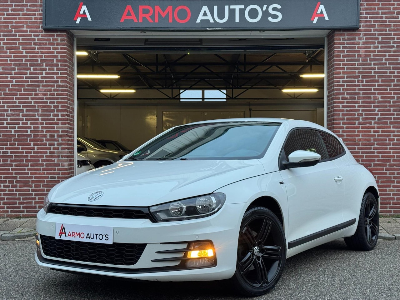 Volkswagen Scirocco - 1.4 TSI | Navi | Cruise | Rijklaar - AutoWereld.nl