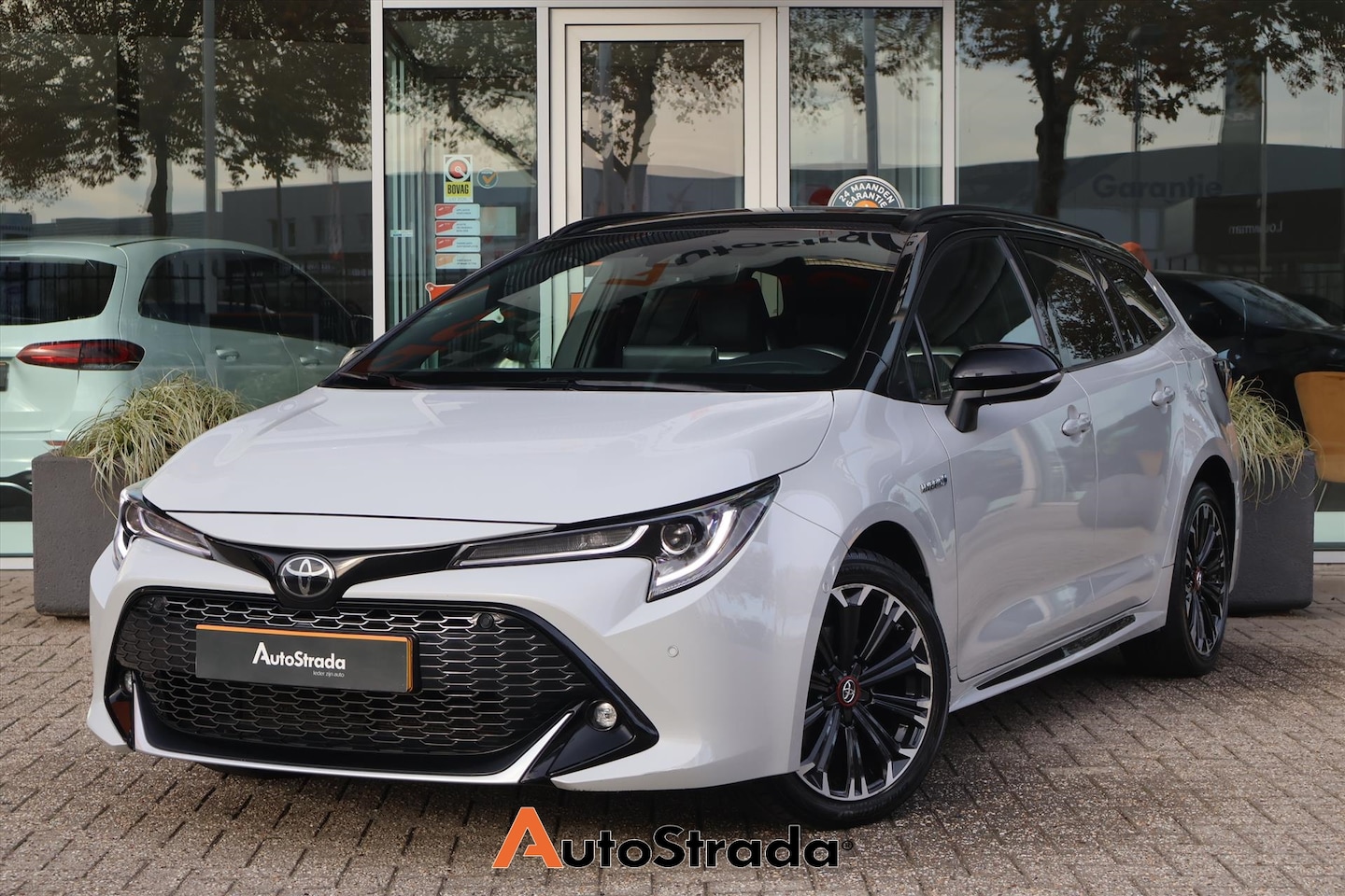 Toyota Corolla Touring Sports - 1.8 GR-Sport 122pk | Camera | Stoelverwarming | LED | Adaptive | Climate | Carplay - AutoWereld.nl