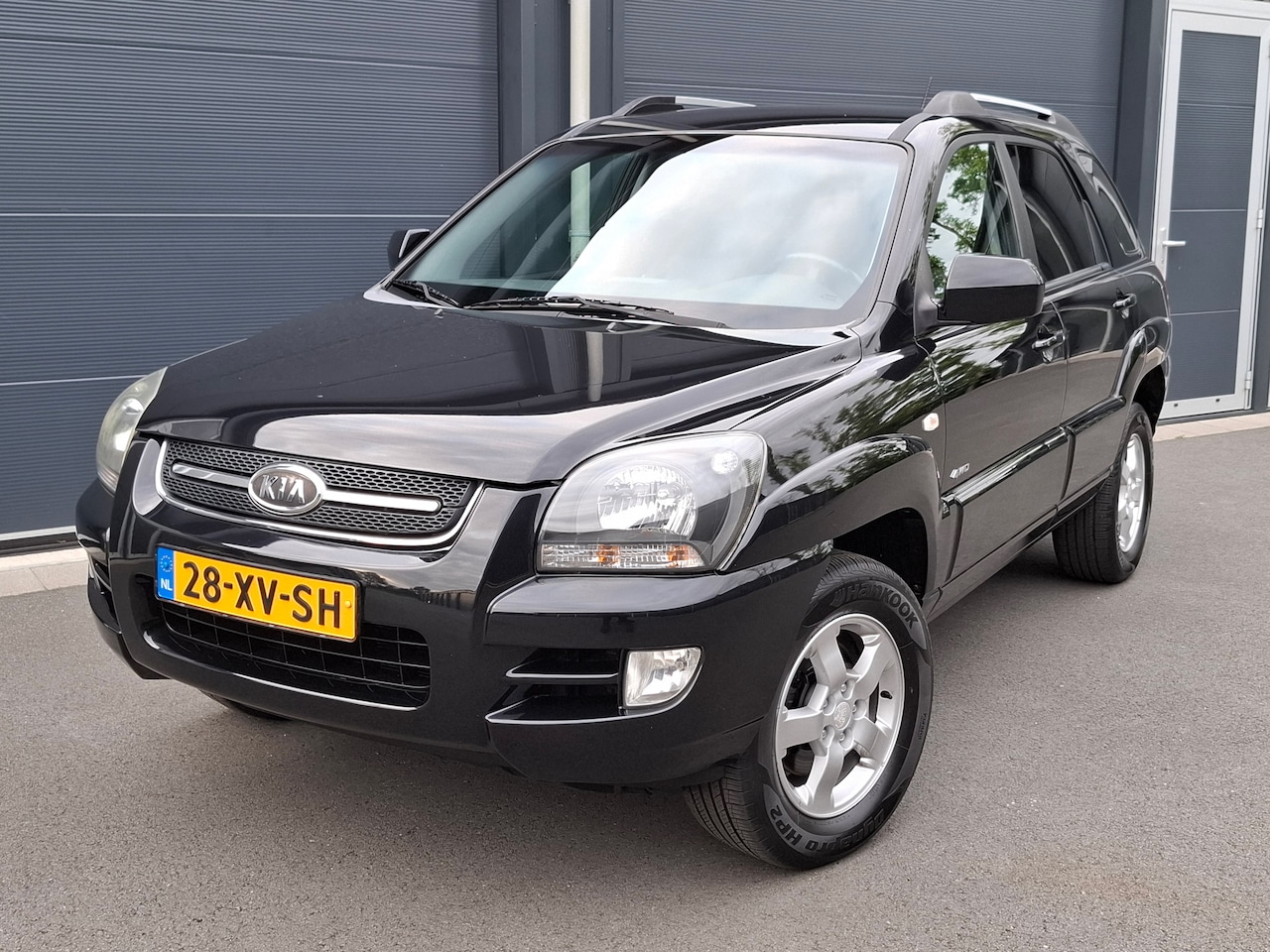 Kia Sportage - 2.0 CVVT Adventure 4WD - AutoWereld.nl