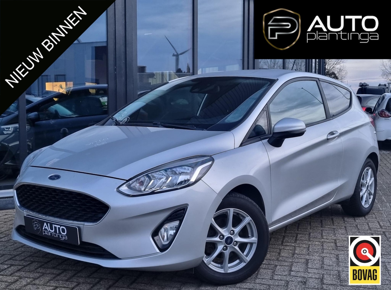 Ford Fiesta - 1.1 Trend | Stoelverwarming | Cruise Control | Airco | Parkeersensoren | Voorruitverwarmin - AutoWereld.nl
