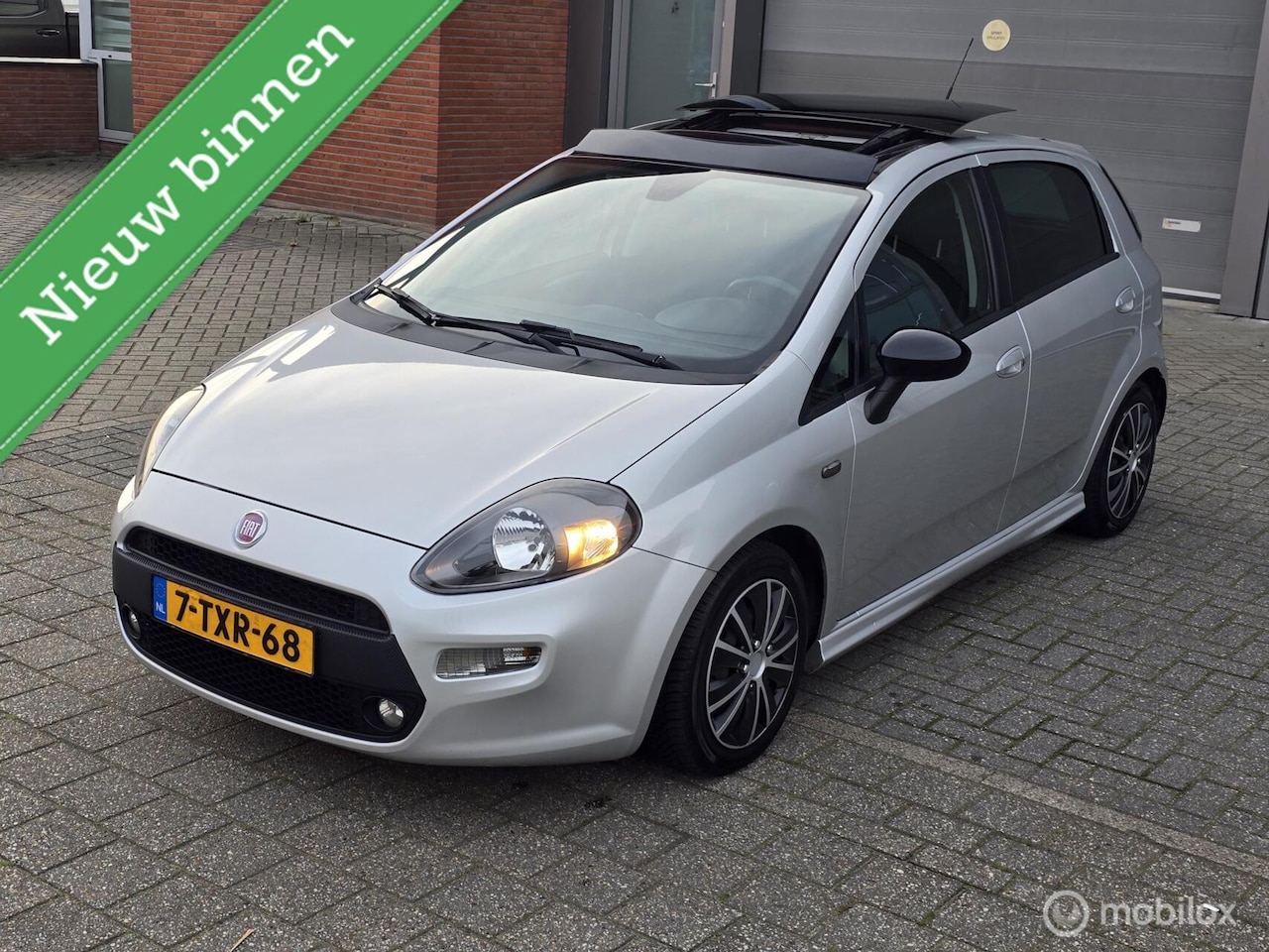 Fiat Punto Evo - 0.9 TwinAir Lounge✅️Airco✅️ - AutoWereld.nl