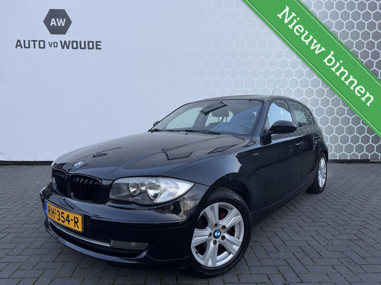 BMW 1-serie - 116i High Executive Stoelverwarming - AutoWereld.nl