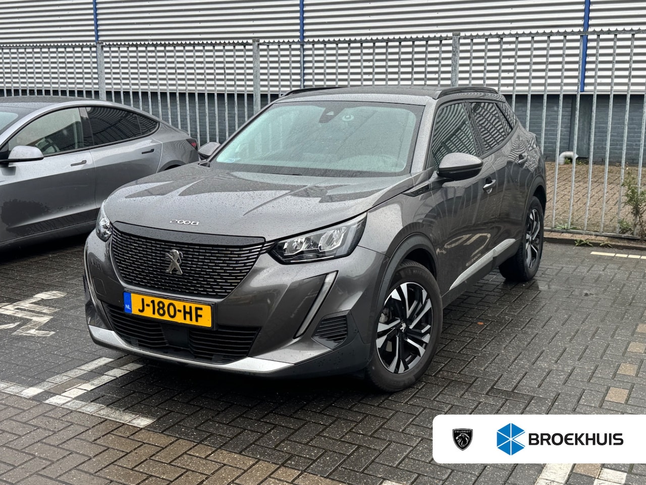 Peugeot 2008 - 1.2 PureTech Allure | Achteruitrijcamera | Climate Control | Cruise Control | Extra getint - AutoWereld.nl