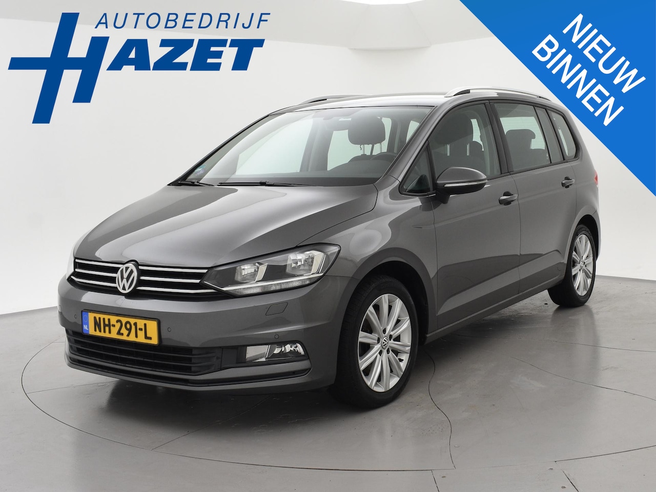 Volkswagen Touran - 1.4 TSI 150 PK DSG AUT. 7-PERSOONS HIGHLINE + TREKHAAK | APPLE CARPLAY | STOELVERWARMING - AutoWereld.nl