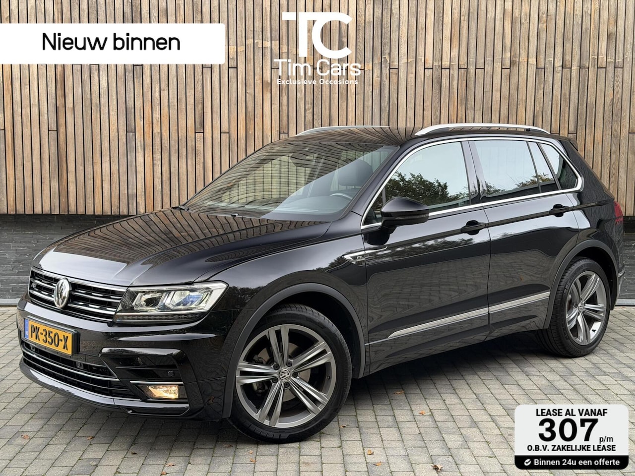 Volkswagen Tiguan - 1.4 TSI R-line Handgeschakeld | Half/leer | R-line stuurwiel | LED verlichting | Stoelverw - AutoWereld.nl