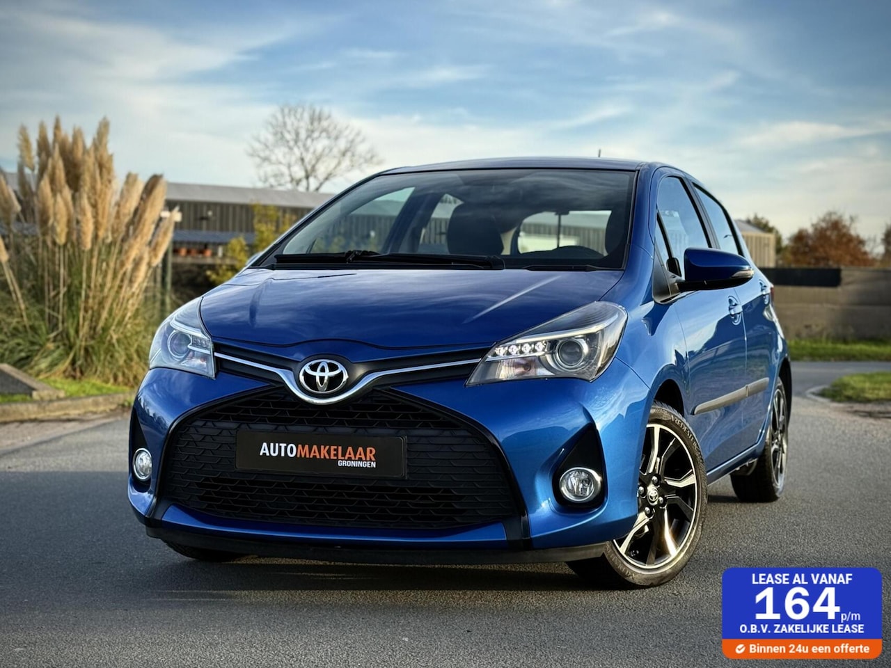 Toyota Yaris - 1.3 VVT-i Dynamic 6Bak 5 deurs Navigatie|Cruise control|Airco - AutoWereld.nl
