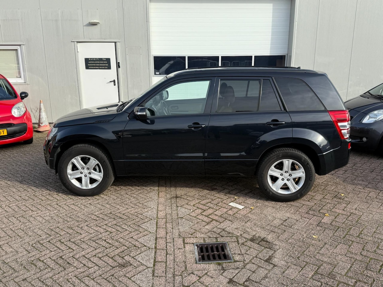 Suzuki Grand Vitara - 2.4 Exclusive AUTOMAAT!! - AutoWereld.nl