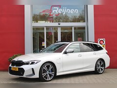 BMW 3-serie Touring - 330e 292PK M-SPORT | M-SPORT PRO-PAKKET | M-SPORT REMMEN UITGEVOERD IN DONKERBLAUW MET M L