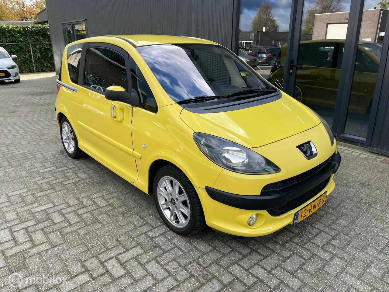 Peugeot 1007 - 1.6-16V Sporty 1.6-16V Sporty - AutoWereld.nl