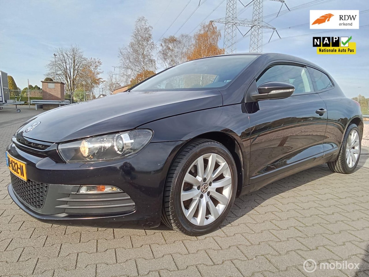 Volkswagen Scirocco - 1.4 TSI/clima/navi/pdc - AutoWereld.nl