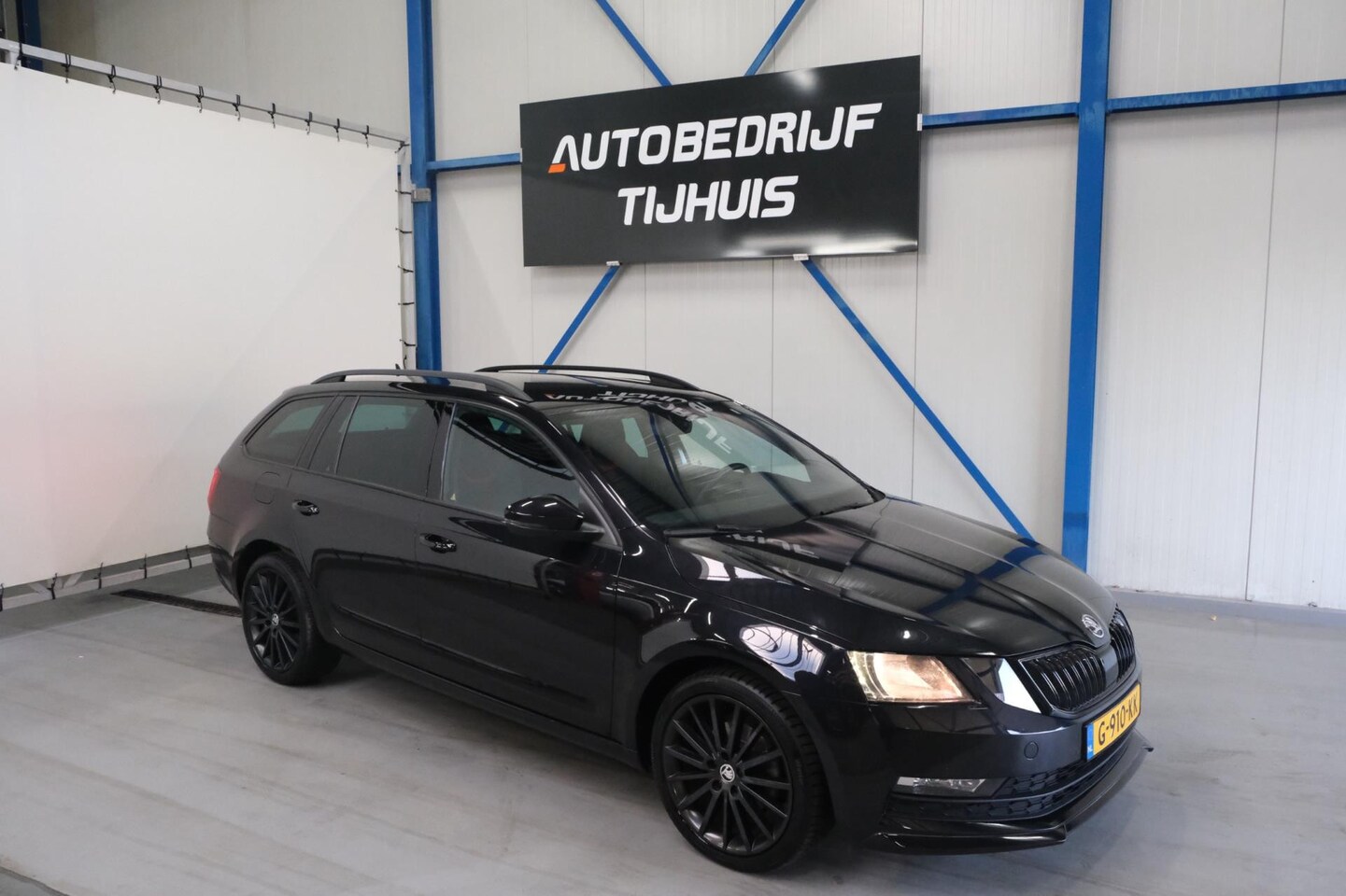 Skoda Octavia Combi - 1.5 TSI Greentech Sport Business - N.A.P. Airco, Cruise, Navi, PDC, Trekhaak. - AutoWereld.nl