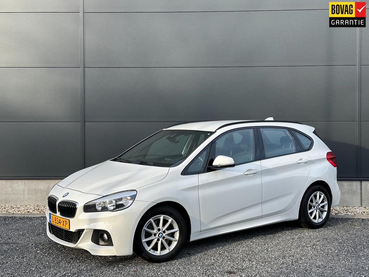 BMW 2-serie Active Tourer - 218i Luxury M-pakket | Clima | Navi | Stoelverwarming - AutoWereld.nl