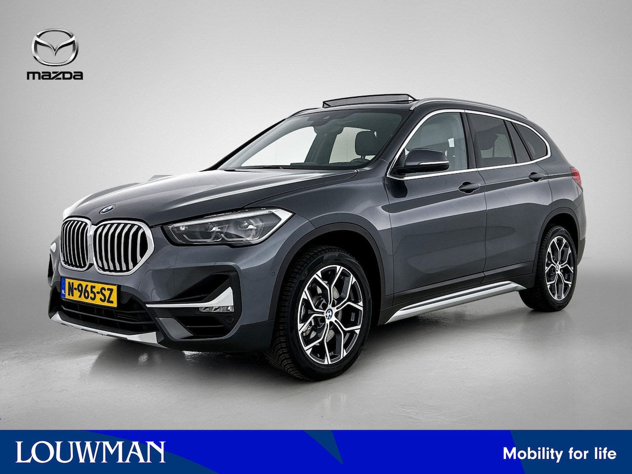 BMW X1 - sDrive20i Business Edition Plus / Panoramadak / Elec. BMW sportstoelen / Sfeerverlichting - AutoWereld.nl