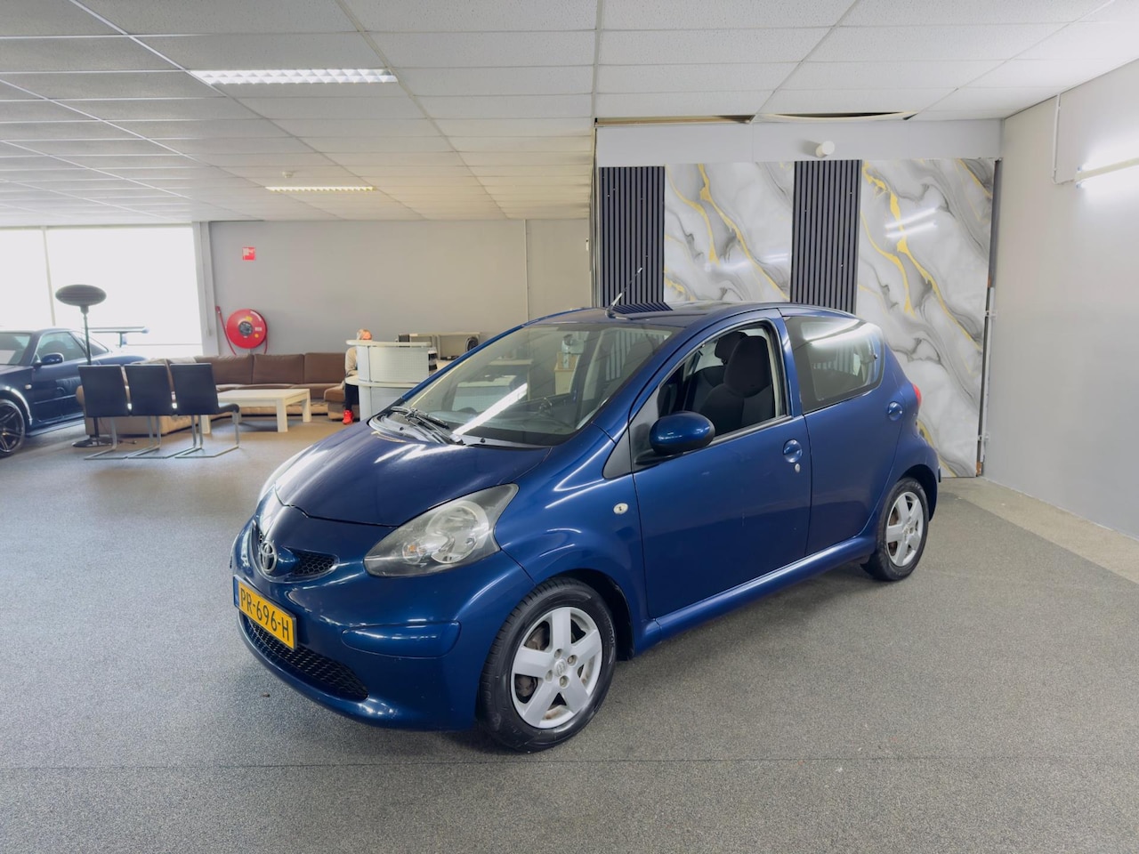 Toyota Aygo - 1.0-12V Apk Nieuw,Airco,E-Ramen,Toerental,Bluetooth-bellen,N.A.P,Lm velgen,5Deurs,Topstaat - AutoWereld.nl