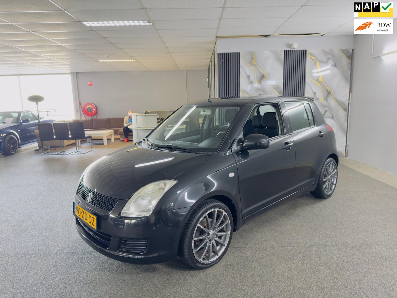 Suzuki Swift - 1.5 Cool Apk Nieuw,Airco,E-Ramen,N.A.P,Navigatie,Lm velgen,Spoiler,5Deurs,2 sleutels,Top A - AutoWereld.nl