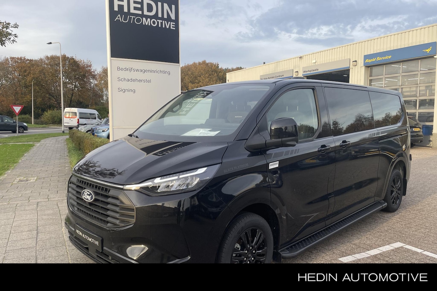 Ford Transit Custom - 320 2.5 PHEV L2H1 GB Limited Black Platinum - AutoWereld.nl