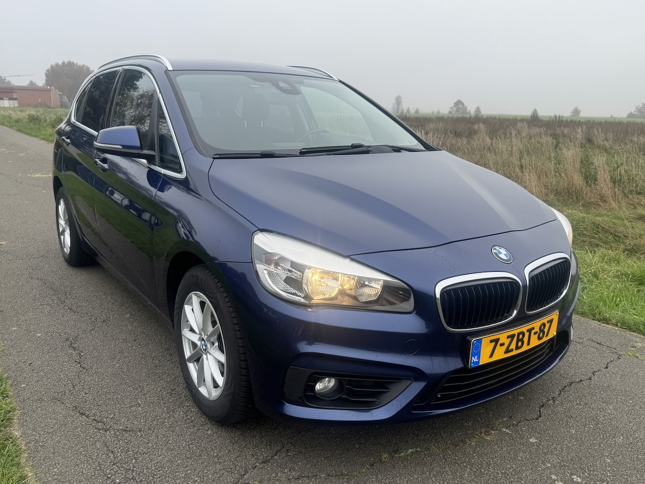 BMW 2-serie Active Tourer - 218i Executive ECC/CRUISE/NAVI/PDC - AutoWereld.nl