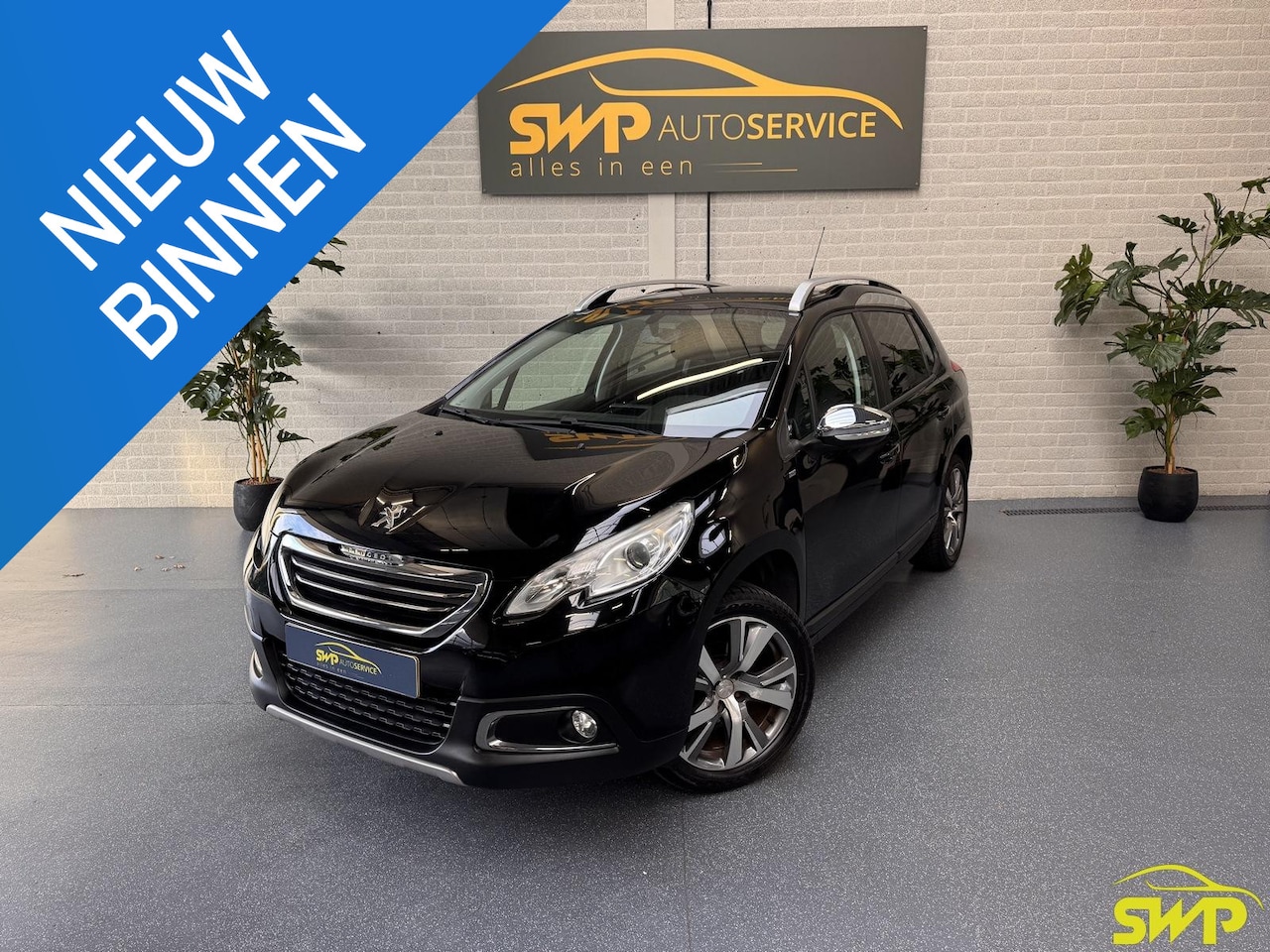 Peugeot 2008 - 1.2 PureTech Style | Navi | Pano | PDC | Trekhaak - AutoWereld.nl
