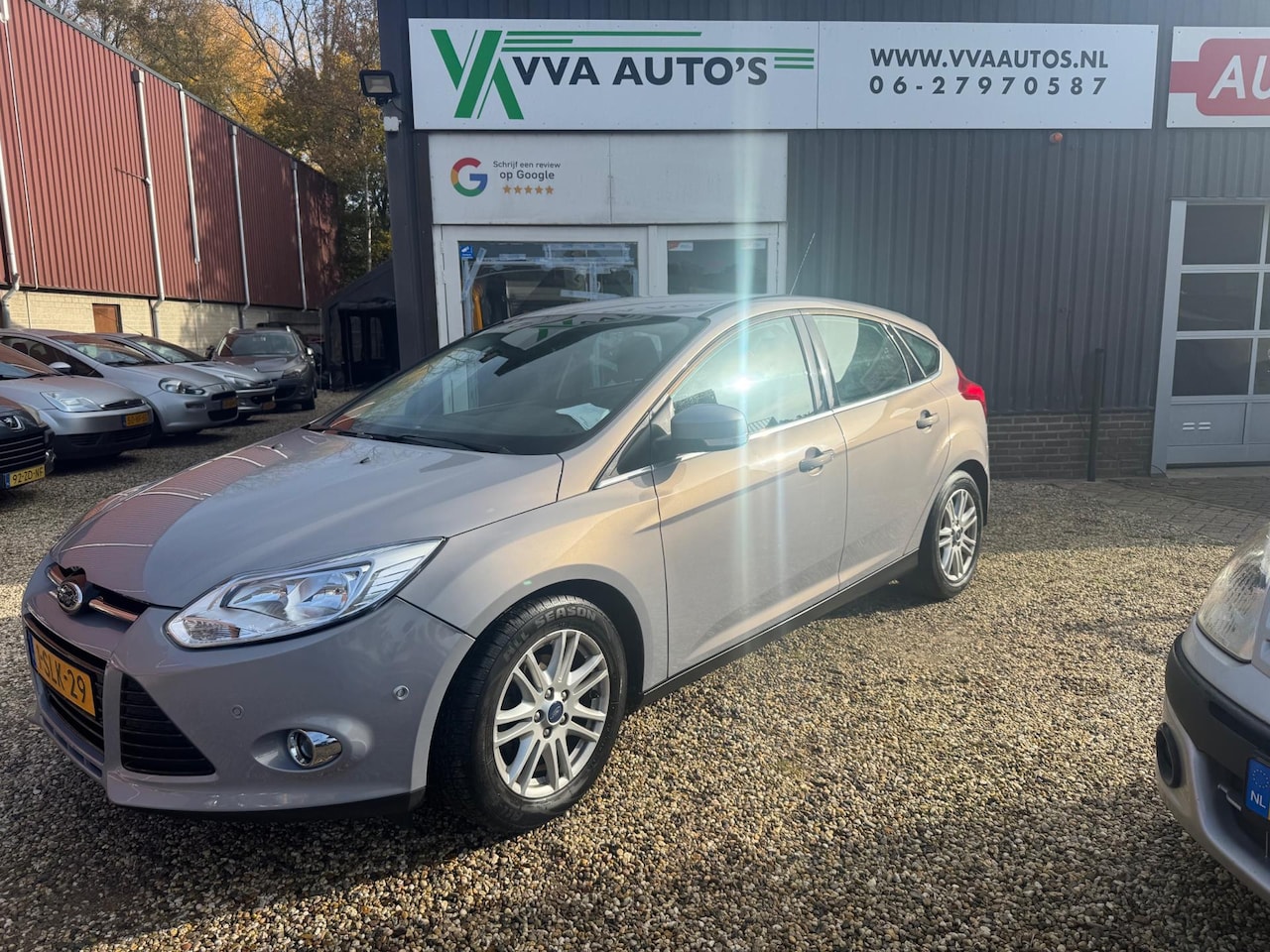 Ford Focus - 1.0 Titanium cruise contr,clima, Autom inparkeren, vol opties! - AutoWereld.nl